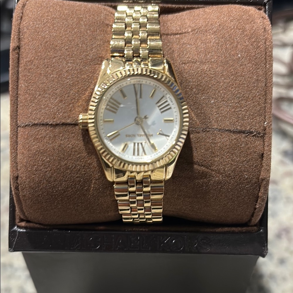 Michael Kors Gold Timepiece with White Face